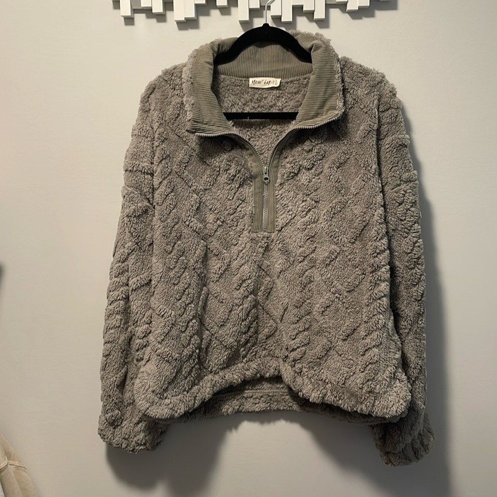 Furry diamond patterned fleece size large.